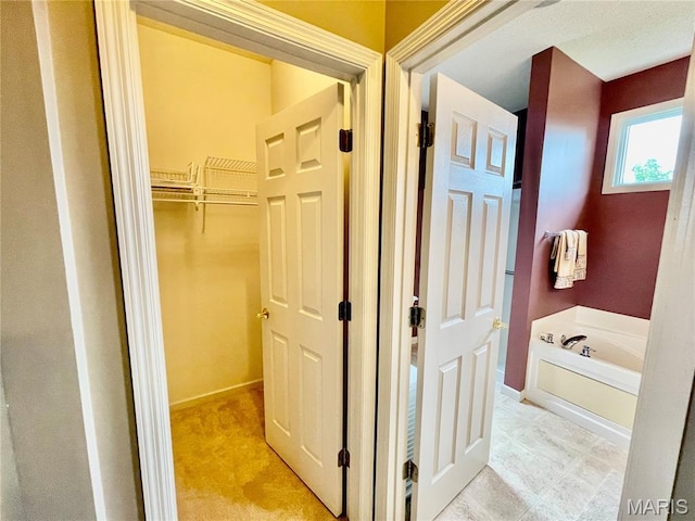2087 Hawks Landing Dr, Lake St Louis, MO 63367 - full bathroom featuring a bath and baseboards