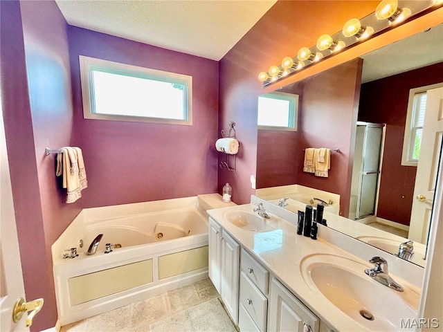 2087 Hawks Landing Dr, Lake St Louis, MO 63367 - full bath with a whirlpool tub, plenty of natural light, and a stall shower
