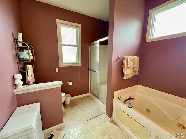 2087 Hawks Landing Dr, Lake St Louis, MO 63367 - full bath with a stall shower, healthy amount of natural light, and a jetted tub
