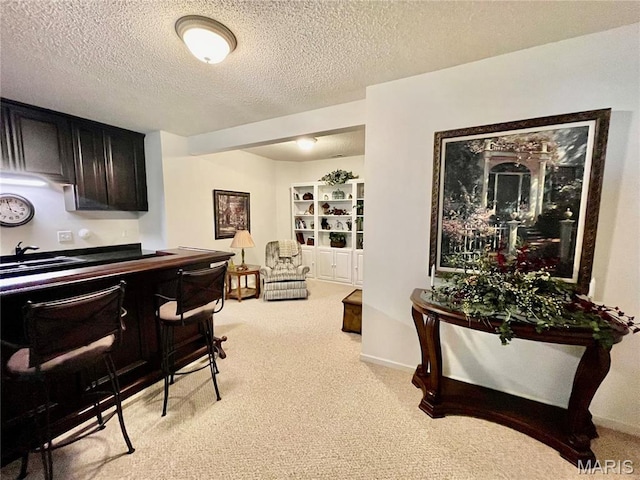 2087 Hawks Landing Dr, Lake St Louis, MO 63367 - kitchen with light carpet and a textured ceiling