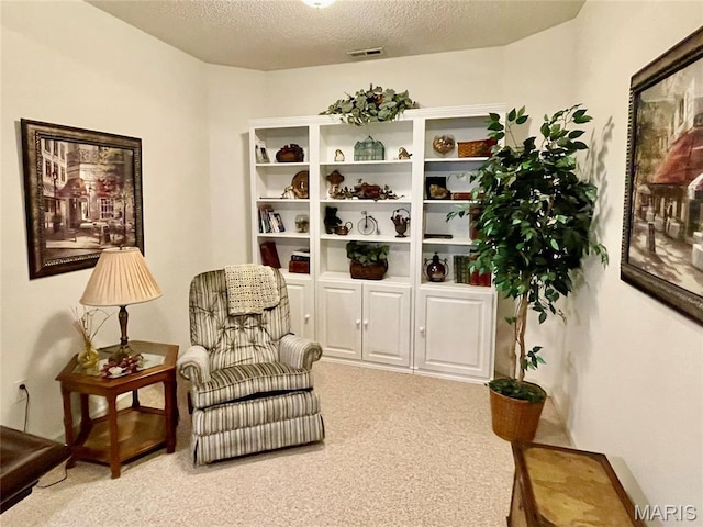 2087 Hawks Landing Dr, Lake St Louis, MO 63367 - sitting room featuring carpet flooring and a textured ceiling