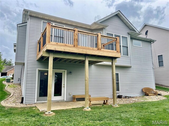 2087 Hawks Landing Dr, Lake St Louis, MO 63367 - back of property featuring a yard, a patio, and a wooden deck