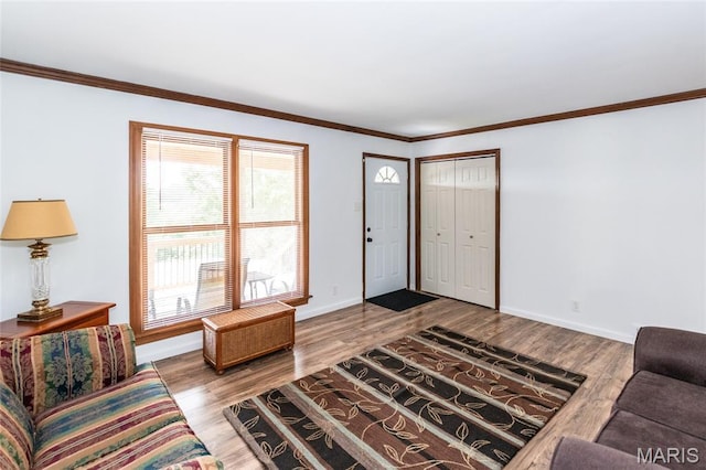 2915 Ozark Dr, Queeny Township, MO 63122 - living room with baseboards, wood finished floors, and ornamental molding