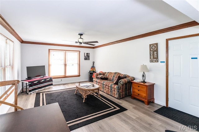 2915 Ozark Dr, Queeny Township, MO 63122 - living area with ceiling fan, crown molding, wood finished floors, and baseboards