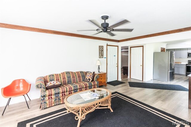 2915 Ozark Dr, Queeny Township, MO 63122 - living room featuring light wood-style flooring, crown molding, and ceiling fan