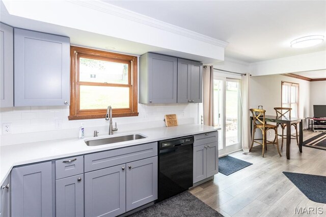2915 Ozark Dr, Queeny Township, MO 63122 - kitchen featuring black dishwasher, a sink, gray cabinetry, tasteful backsplash, and crown molding