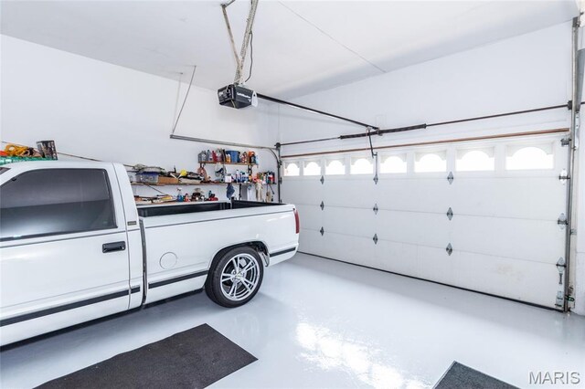 2915 Ozark Dr, Queeny Township, MO 63122 - garage with a garage door opener