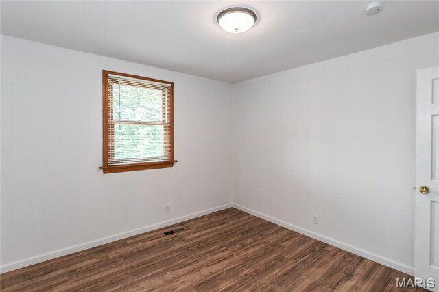 2915 Ozark Dr, Queeny Township, MO 63122 - spare room with dark wood finished floors, baseboards, and a smoke detector