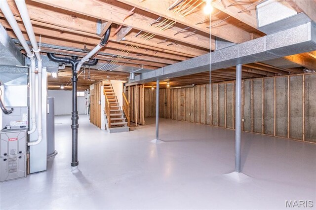 2915 Ozark Dr, Queeny Township, MO 63122 - unfinished below grade area with stairs and heating unit