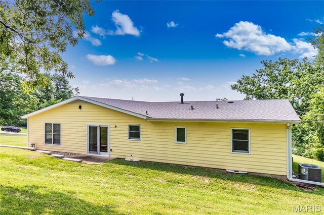 2915 Ozark Dr, Queeny Township, MO 63122 - back of house featuring a yard, cooling unit, and a patio area