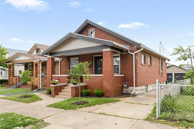 6927 Lansdowne Ave, Saint Louis, MO 63109 - view of front facade with brick siding and covered porch