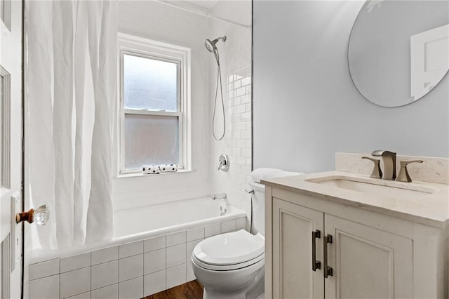 6927 Lansdowne Ave, Saint Louis, MO 63109 - full bathroom featuring toilet, shower / bath combo, vanity, and wood finished floors