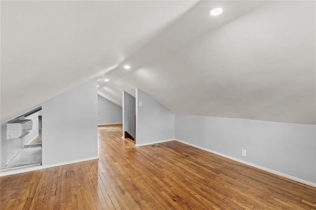6927 Lansdowne Ave, Saint Louis, MO 63109 - additional living space featuring lofted ceiling, hardwood / wood-style flooring, recessed lighting, and baseboards