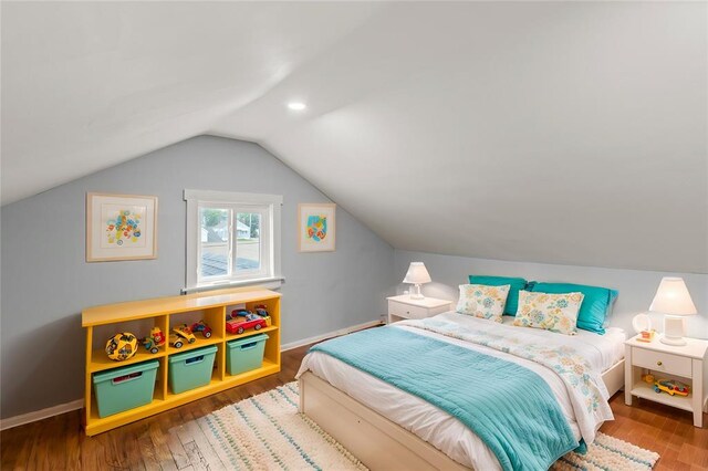 6927 Lansdowne Ave, Saint Louis, MO 63109 - bedroom with lofted ceiling, wood finished floors, recessed lighting, and baseboards