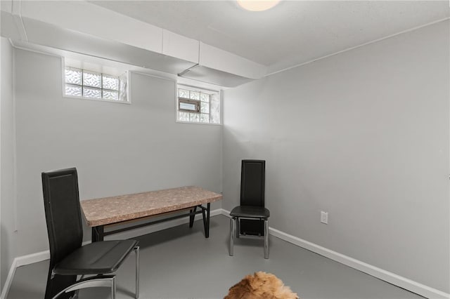 6927 Lansdowne Ave, Saint Louis, MO 63109 - living area featuring baseboards and concrete flooring