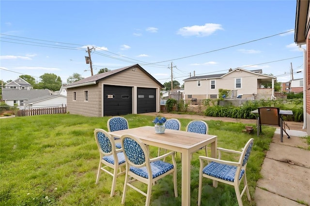 6927 Lansdowne Ave, Saint Louis, MO 63109 - view of yard with a garage, an outbuilding, and outdoor dining space