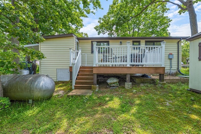 14135 Oak Dr, De Soto, MO 63020 - back of house with a deck, a yard, and stairs