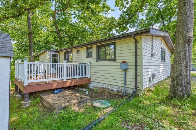 14135 Oak Dr, De Soto, MO 63020 - back of property with a wooden deck