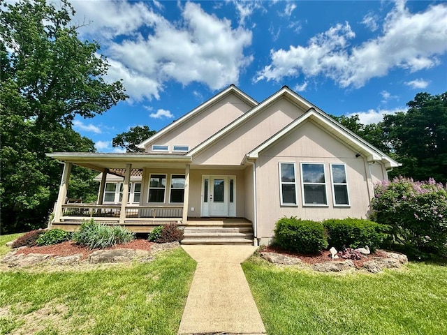 14800 County Road 448, St James, MO 65559 - view of front of house featuring covered porch and a front yard