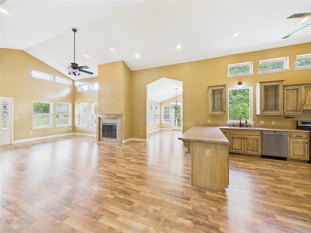 14800 County Road 448, St James, MO 65559 - kitchen featuring dishwasher, a ceiling fan, a sink, open floor plan, and high vaulted ceiling