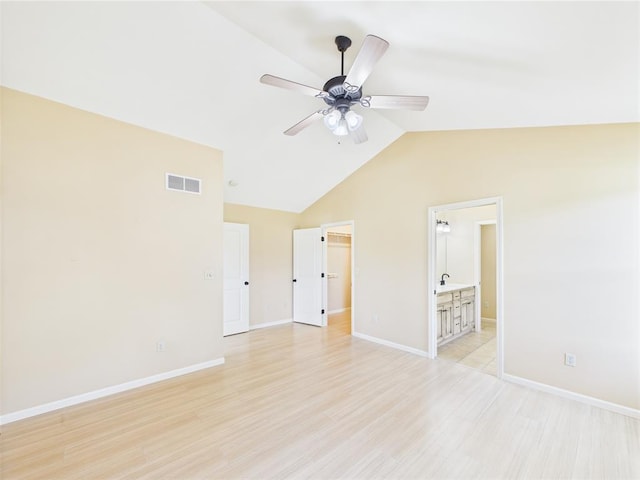 14800 County Road 448, St James, MO 65559 - unfurnished room featuring a ceiling fan, lofted ceiling, baseboards, and light wood finished floors
