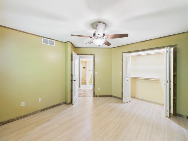 14800 County Road 448, St James, MO 65559 - unfurnished room with a ceiling fan, baseboards, and light wood-style floors