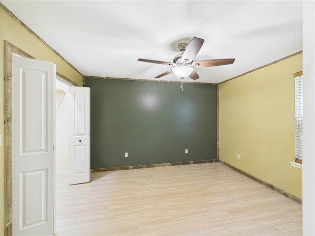 14800 County Road 448, St James, MO 65559 - spare room featuring ceiling fan, light wood-style flooring, and baseboards