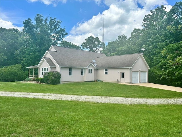 14800 County Road 448, St James, MO 65559 - ranch-style home with driveway, an attached garage, and a front yard