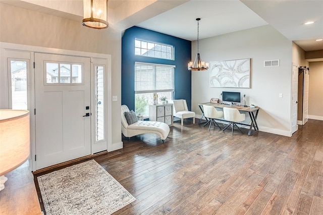 223 Ellington Ct, Glen Carbon, IL 62034 - entryway with wood finished floors, recessed lighting, a chandelier, and baseboards