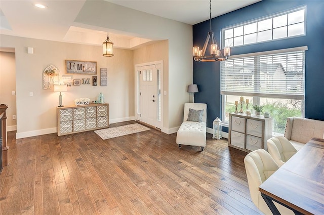 223 Ellington Ct, Glen Carbon, IL 62034 - entryway with a chandelier, hardwood / wood-style flooring, and baseboards