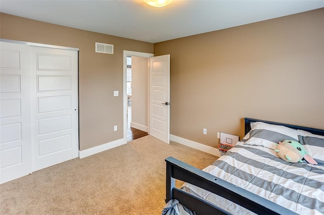 223 Ellington Ct, Glen Carbon, IL 62034 - carpeted bedroom with baseboards and a closet