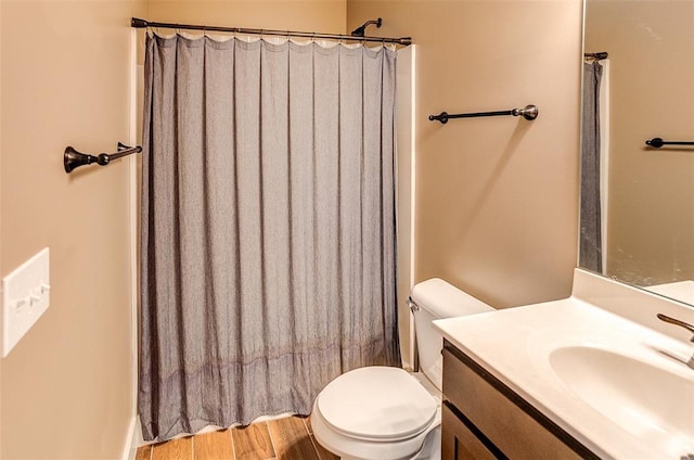 223 Ellington Ct, Glen Carbon, IL 62034 - bathroom with toilet, vanity, and wood finished floors
