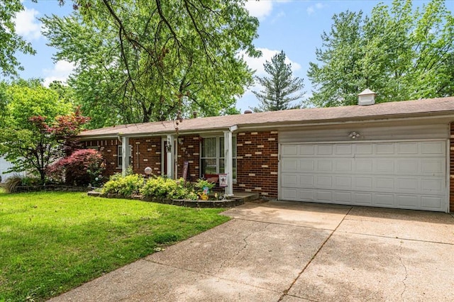 930 Laredo Ave, Saint Louis, MO 63138 - ranch-style home featuring an attached garage, driveway, a front lawn, and brick siding