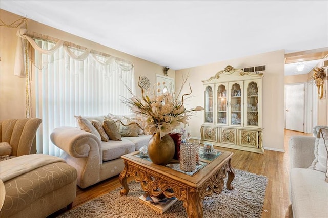 930 Laredo Ave, Saint Louis, MO 63138 - living room with plenty of natural light and wood finished floors