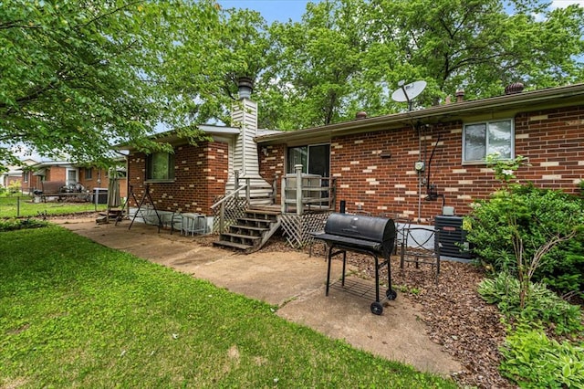 930 Laredo Ave, Saint Louis, MO 63138 - view of patio featuring grilling area and a wooden deck