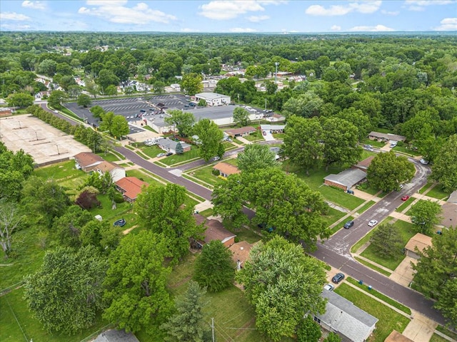 930 Laredo Ave, Saint Louis, MO 63138 - aerial view of property and surrounding area with a heavily wooded area and nearby suburban area