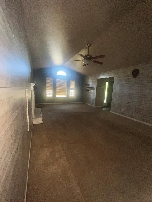 14345 Howard Ln, Dixon, MO 65459 - carpeted empty room featuring a ceiling fan and vaulted ceiling