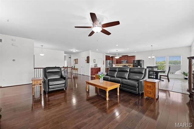 38 Crystal Manor Ct, Wentzville, MO 63385 - living room with a ceiling fan, dark wood-style floors, a chandelier, and recessed lighting