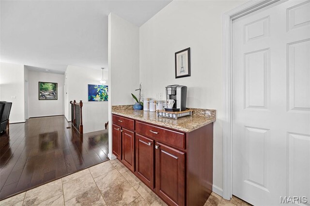 38 Crystal Manor Ct, Wentzville, MO 63385 - bar area featuring baseboards