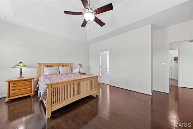 38 Crystal Manor Ct, Wentzville, MO 63385 - bedroom with wood-type flooring, a tray ceiling, and ceiling fan