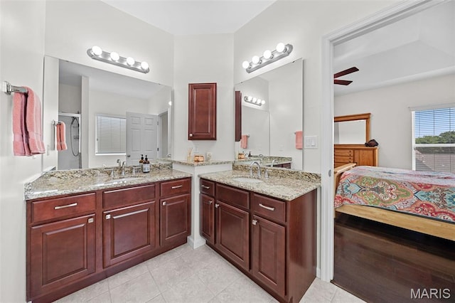38 Crystal Manor Ct, Wentzville, MO 63385 - ensuite bathroom featuring two vanities, tile patterned floors, and a ceiling fan
