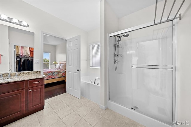38 Crystal Manor Ct, Wentzville, MO 63385 - full bathroom with a stall shower, a garden tub, vanity, tile patterned floors, and ensuite bath