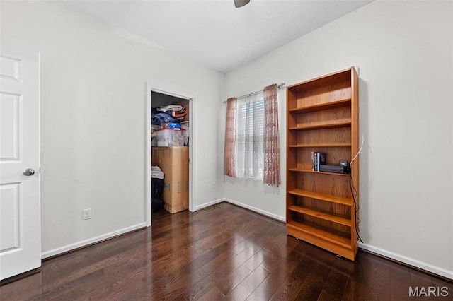 38 Crystal Manor Ct, Wentzville, MO 63385 - unfurnished bedroom with a spacious closet, baseboards, and wood finished floors