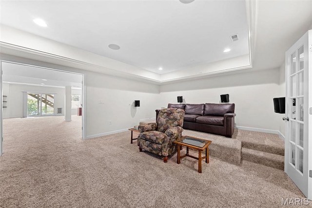 38 Crystal Manor Ct, Wentzville, MO 63385 - living area with carpet flooring, baseboards, french doors, a raised ceiling, and recessed lighting