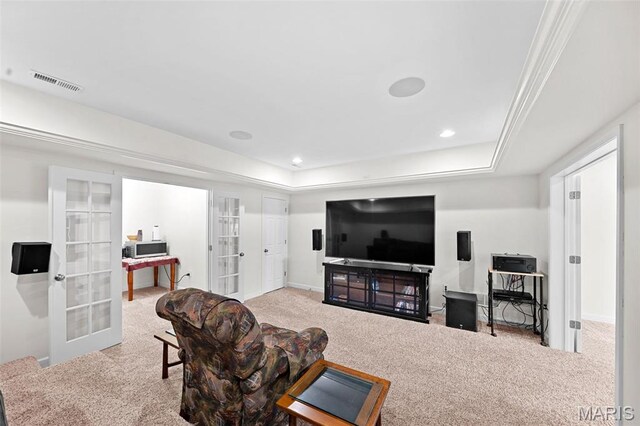 38 Crystal Manor Ct, Wentzville, MO 63385 - carpeted living room with french doors, a raised ceiling, baseboards, and recessed lighting