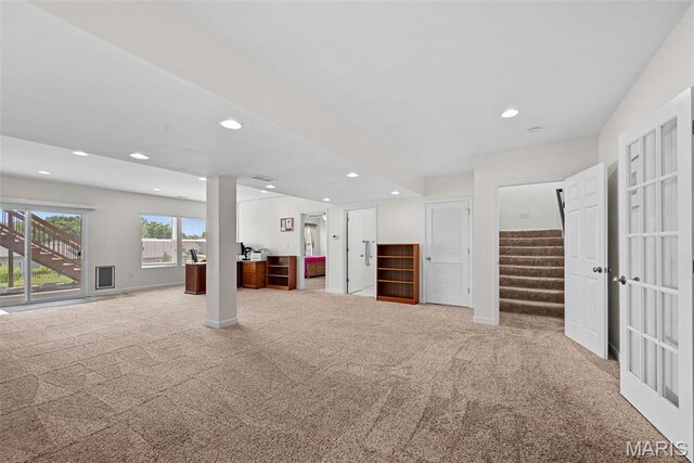 38 Crystal Manor Ct, Wentzville, MO 63385 - unfurnished living room with carpet, recessed lighting, stairs, and baseboards