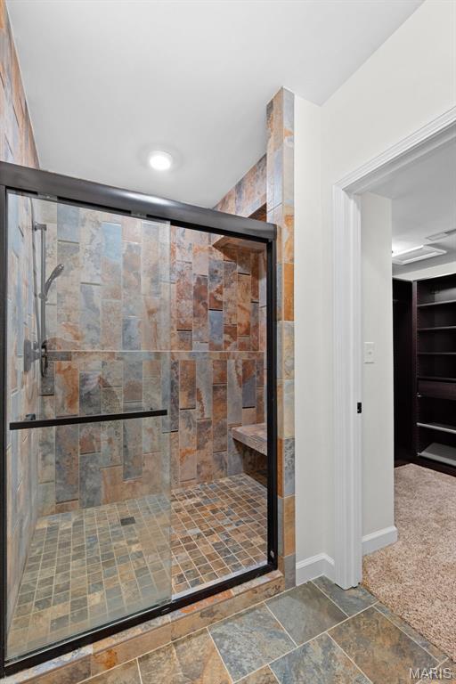 38 Crystal Manor Ct, Wentzville, MO 63385 - bathroom with a shower stall and baseboards