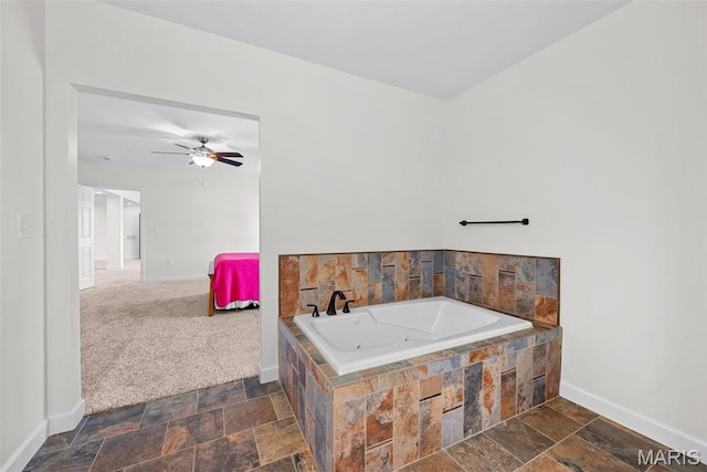 38 Crystal Manor Ct, Wentzville, MO 63385 - full bathroom featuring baseboards, a whirlpool tub, stone finish flooring, and a ceiling fan