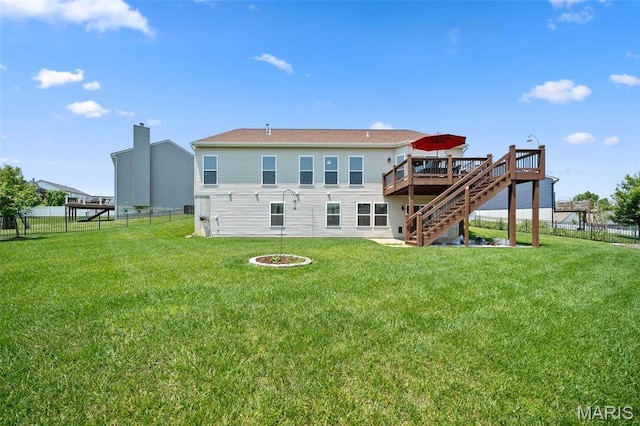 38 Crystal Manor Ct, Wentzville, MO 63385 - rear view of house with stairs and a wooden deck