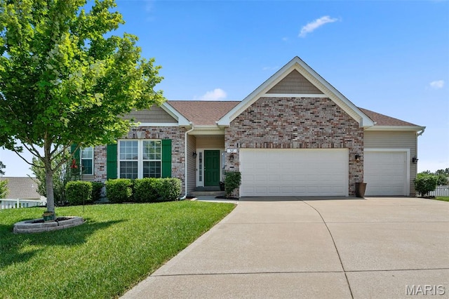 38 Crystal Manor Ct, Wentzville, MO 63385 - view of front of home featuring a garage, a front yard, driveway, and brick siding